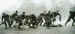 Paratroopers moving off the drop zone during an exercise