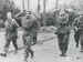 Captured airborne men being marched away