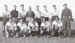 Dennis Chatham with a football team in Palestine