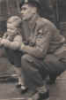 Corporal John Cooper with his son