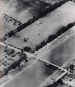 An aerial photograph showing Ranville bridge and the glider which carried the platoon who seized it