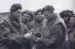 Men of Divisional Signals packing a carrier pigeon