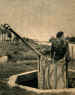 Captain David Wood in 1946 inspects the gun which his platoon captured at Pegasus Bridge