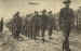 Australian servicemen lead the march past